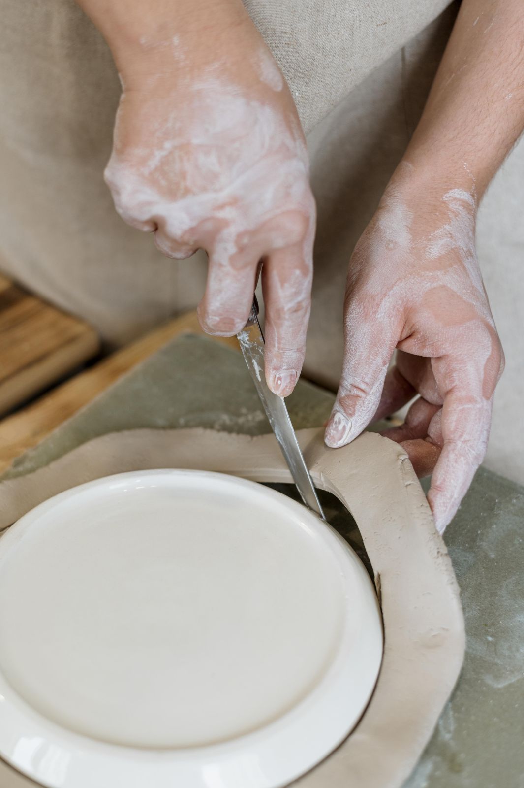 woman-making-clay-pot-her-workshop woman-making-clay-pot-her-workshop